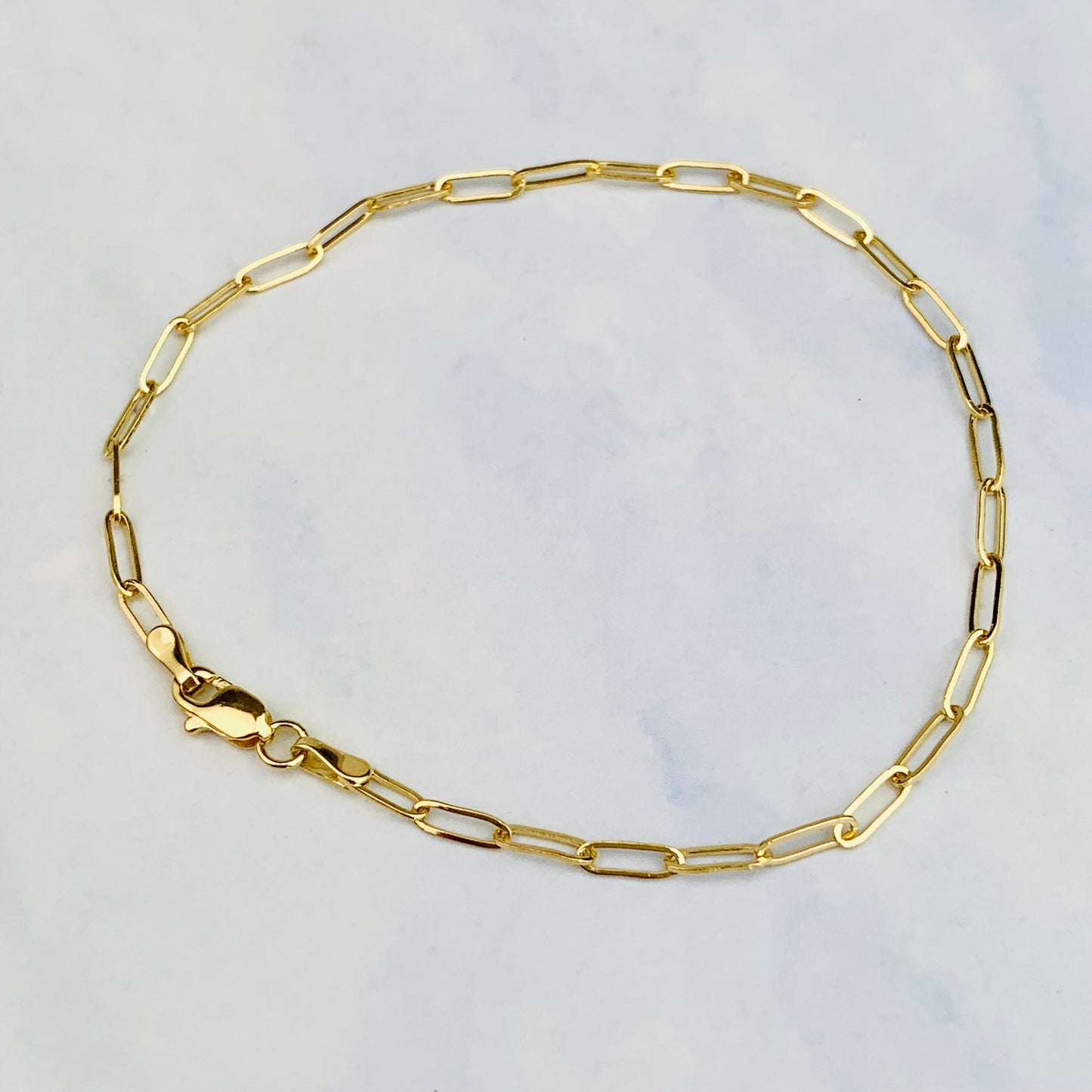 14K Solid Yellow Flat Oval Paper Clip Bracelet With Lobster Clasp - 7 Inches