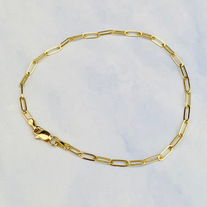 14K Solid Yellow Flat Oval Paper Clip Bracelet With Lobster Clasp - 7 Inches