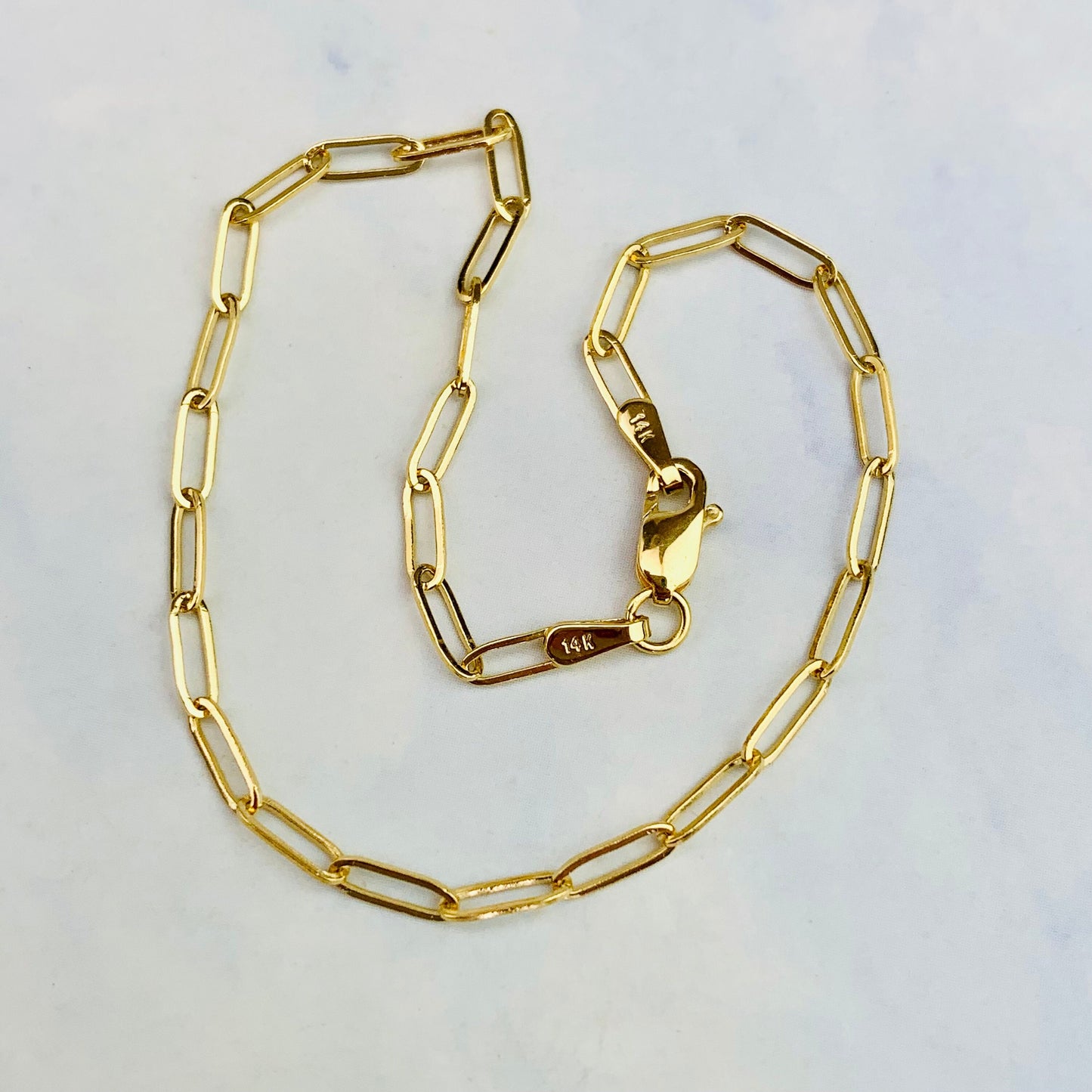 14K Solid Yellow Flat Oval Paper Clip Bracelet With Lobster Clasp - 7 Inches